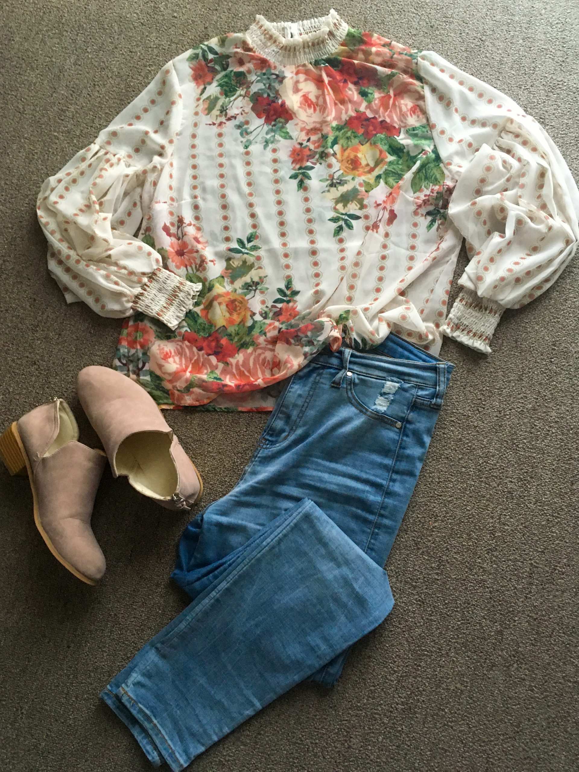 Floral and polka dot shirt with jeans and pink shoes